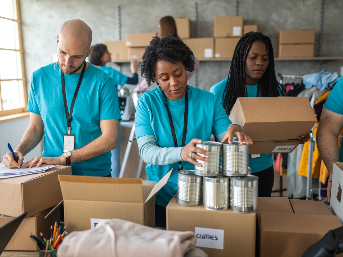 Three people at a volunteering event