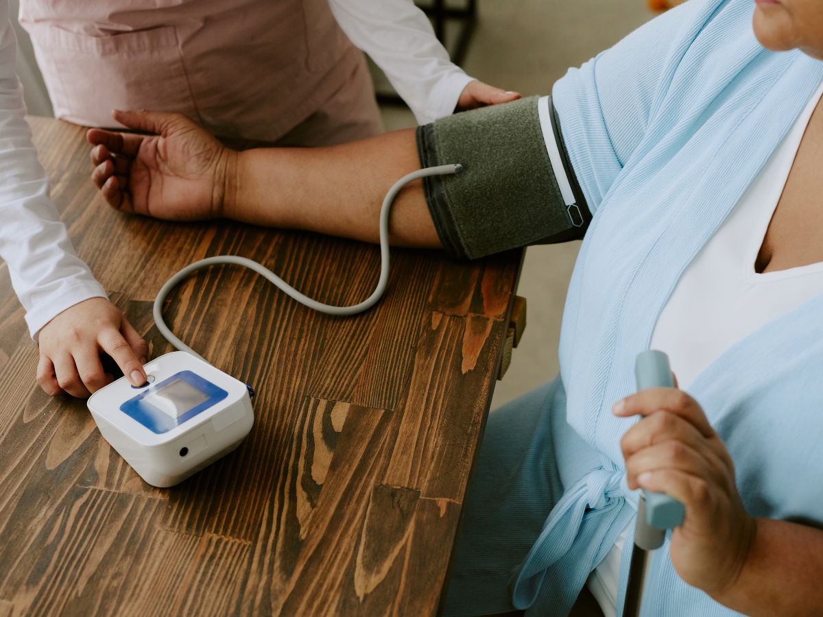 Woman getting her blood pressure taken